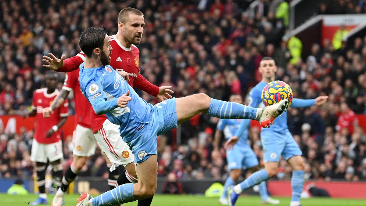 Bernardo Silva of Manchester City scores their team's second goal during the Premier League match between Manchester United and Manchester City at Old Trafford on November 06, 2021 in Manchester, England.