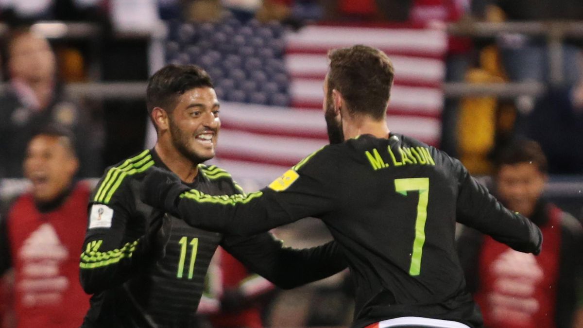 Miguel Layun and Carlos Vela in the match USA-Mexico
