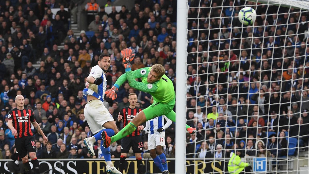 Florin Andone of Brighton & Hove Albion heads past Jonas Lossl of Huddersfield Town for the only goal of the game during the Premier League match between Brighton & Hove Albion and Huddersfield Town at American Express Community Stadium on March 02, 2019