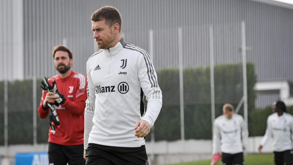 Aaron Ramsey walks out for training with his Juventus teammates