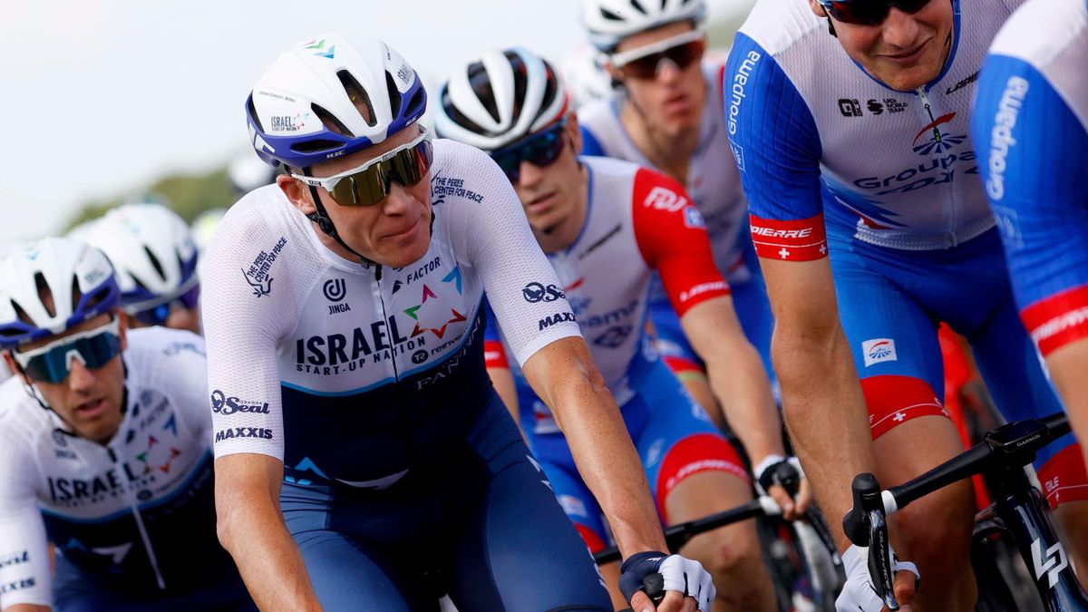 Team Israel Start Up Nation's Christopher Froome of Great Britain (2nd-L) rides in the pack during the 6th stage of the 108th edition of the Tour de France cycling race, 160 km between Tours and Chateauroux, on July 01, 2021. (Photo by Thomas SAMSON / AFP