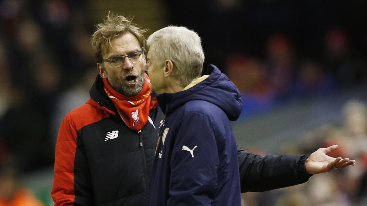 Liverpool manager Juergen Klopp speaks with Arsenal manager Arsene Wenger