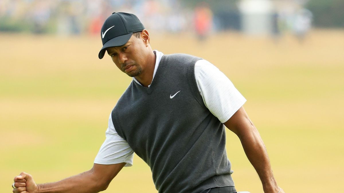 Tiger Woods of the United States reacts to a birdie on the ninth green during the third round of the 147th Open Championship at Carnoustie Golf Club on July 21, 2018 in Carnoustie, Scotland.