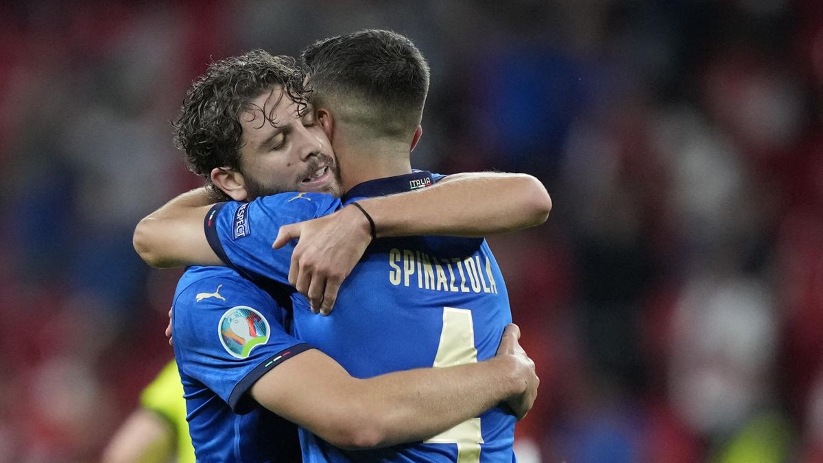 Italy's midfielder Manuel Locatelli (L) celebrate the win with Italy's defender Leonardo Spinazzola after the UEFA EURO 2020 round of 16 football match between Italy and Austria at Wembley Stadium in London on June 26, 2021.