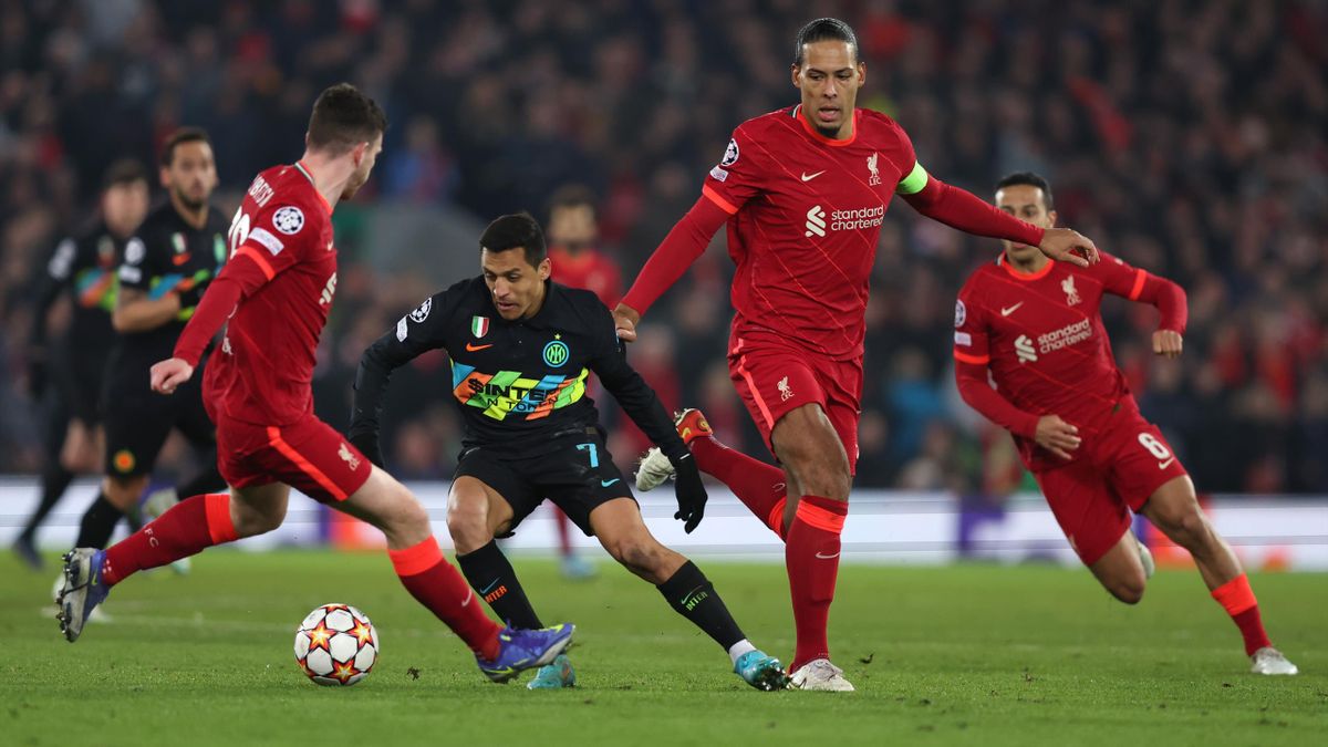Virgil van Dijk of Liverpool and Alexis Sanchez of Inter Milan during the UEFA Champions League Round Of Sixteen