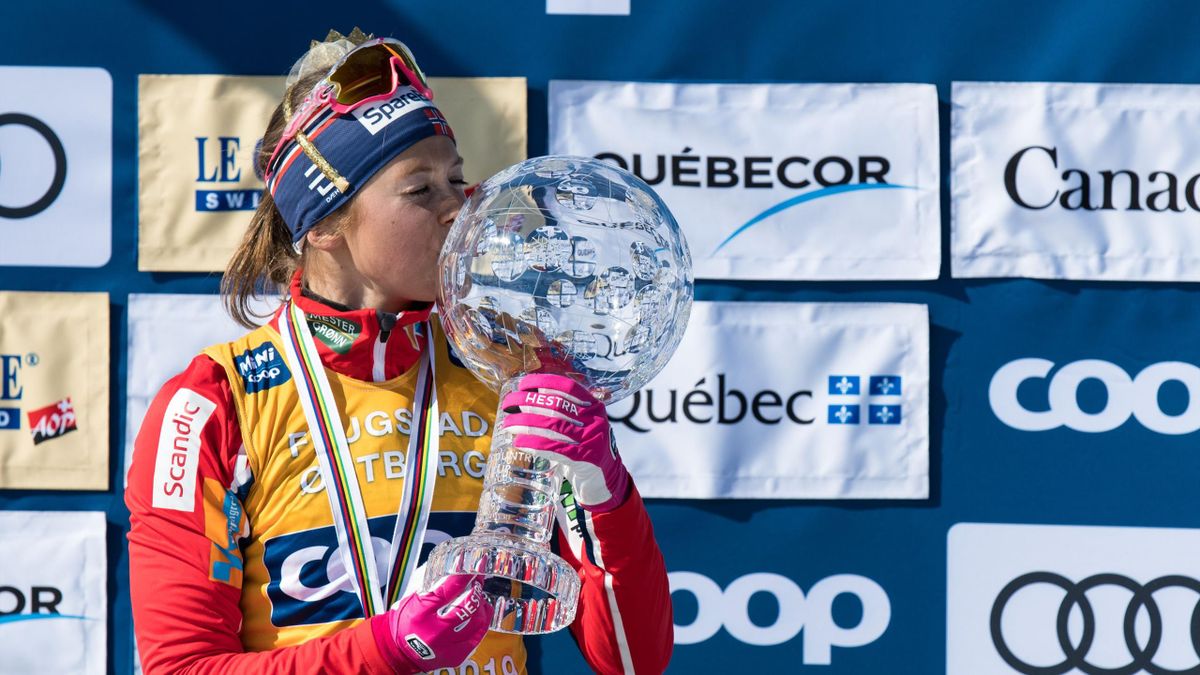 Inglvild Flugstad Oestberg from Norway wins gold and the crystal globe, for overall winners podium for the women's FIS World Cup on March 24, 2019, during the third day of the FIS cross-country world cup finals in Quebec City.