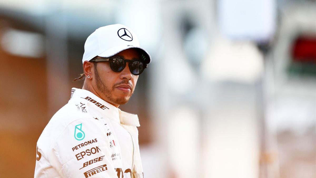 Lewis Hamilton of Great Britain and Mercedes GP looks on before the F1 Grand Prix of Abu Dhabi at Yas Marina Circuit on December 01, 2019 in Abu Dhabi, United Arab Emirates