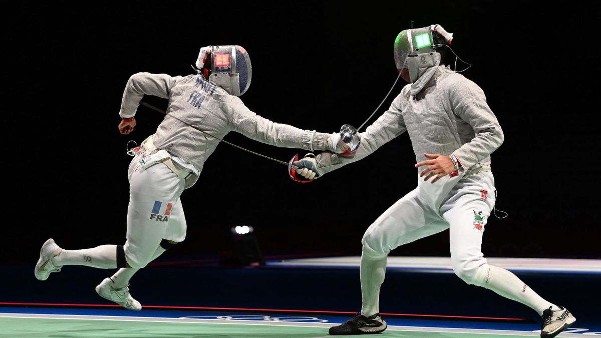 France's Bolade Apithy (L) compete against Iran's Mohammad Rahbari in the men's sabre individual qualifying bout during the Tokyo 2020 Olympic Games at the Makuhari Messe Hall in Chiba City, Chiba Prefecture, Japan, on July 24