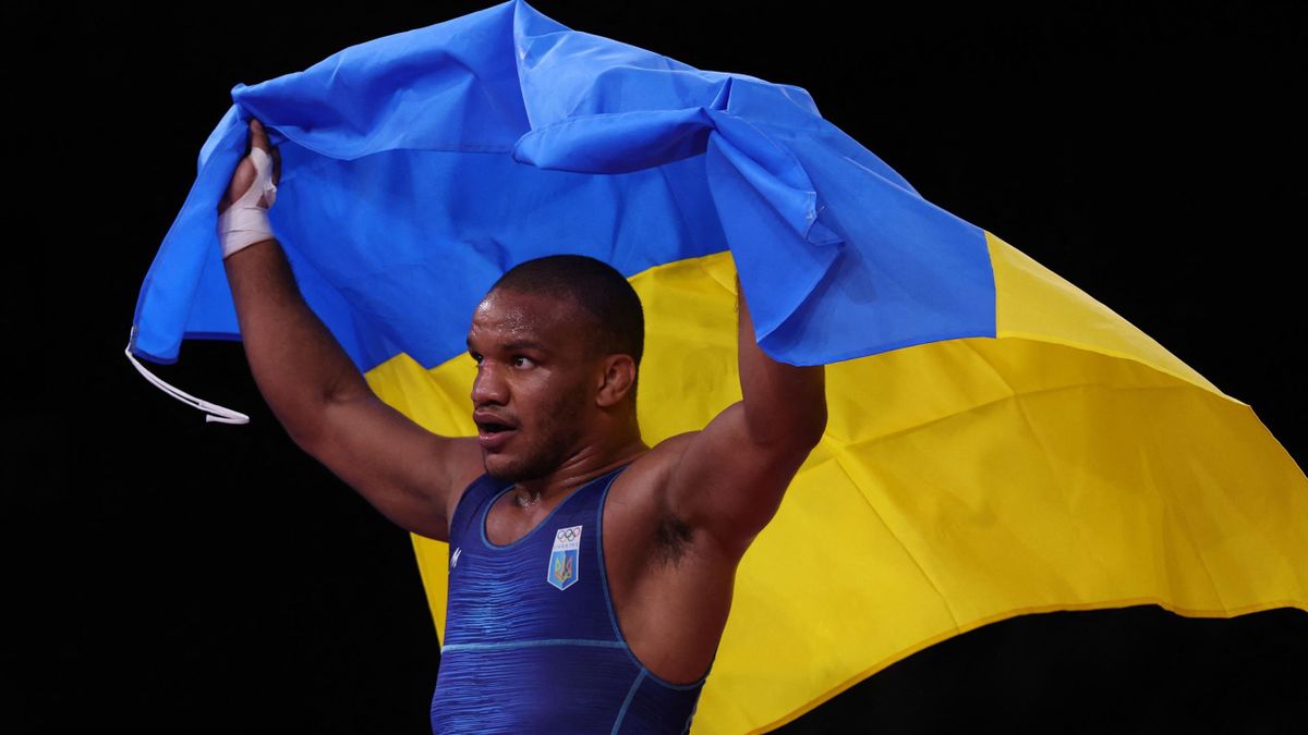 Ukraine's Zhan Beleniuk jubilates after defeating Hungary's Viktor Lorincz in their men's greco-roman 87kg wrestling final match during the Tokyo 2020 Olympic Games