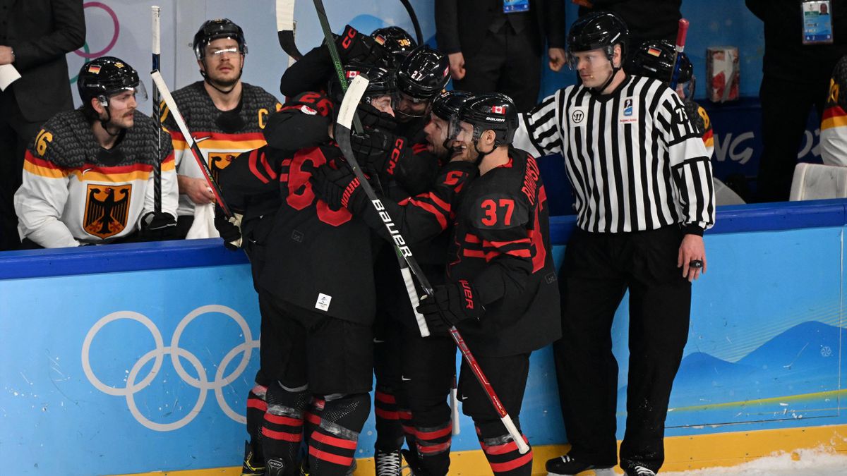 Canada's players celebrate after scoring a goal during the men's preliminary round group A match of the Beijing 2022 Winter Olympic Games ice hockey competition between Canada and Germany, at the Wukesong Sports Centre in Beijing on February 10, 2022