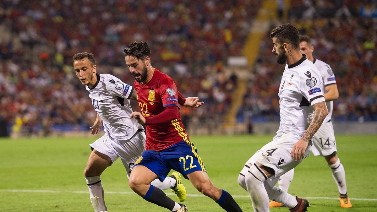 Isco Alarcon of Spain runs past Ergys Kace (right) of Albania during the FIFA 2018 World Cup Qualifier between Spain and Albania at Estadio Jose Rico Perez on October 6, 2017 in Alicante, Spain.