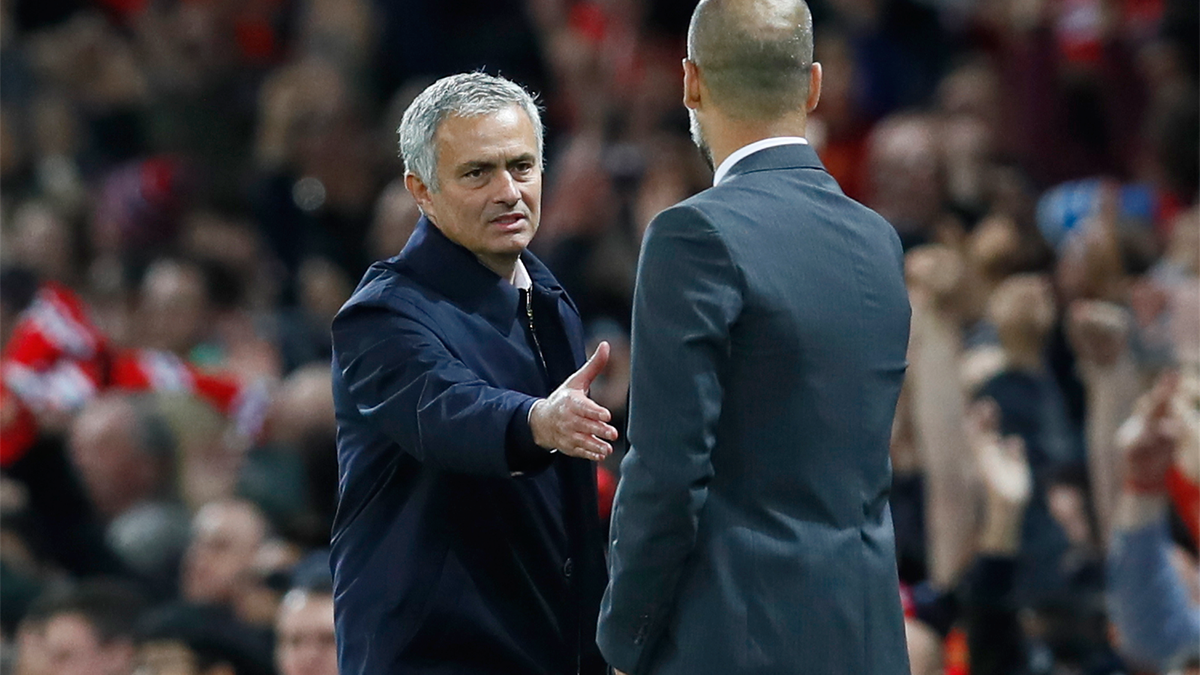 Manchester United manager Jose Mourinho with Manchester City manager Pep Guardiola after the match