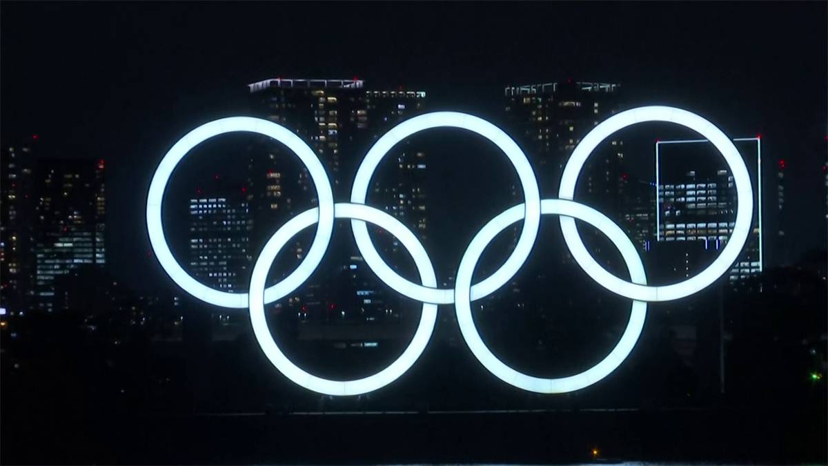 Olympic rings light up Tokyo Bay