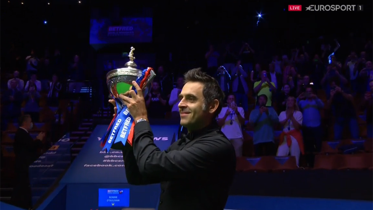 Ronnie O'Sullivan lifts the trophy after winning the 2020 World Snooker Championship