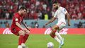 Pierre-Emile Hojbjerg of Denmark and Ali Abdi of Tunisia battle for the ball during the FIFA World Cup Qatar 2022 Group D match between Denmark and Tunisia at Education City Stadium on November 22, 2022 in Al Rayyan, Qatar