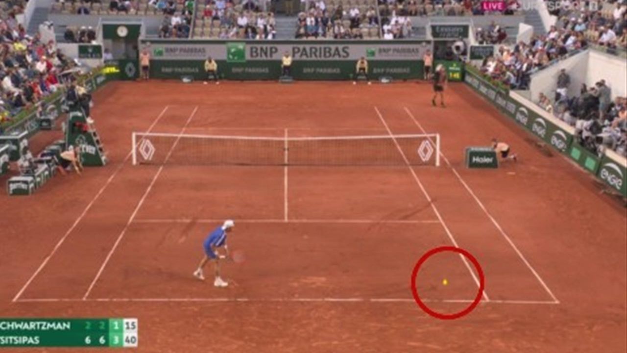 Oh come on! - Stefanos Tsitsipas lands astonishing round the net winner at 2023 French Open - Tennis video
