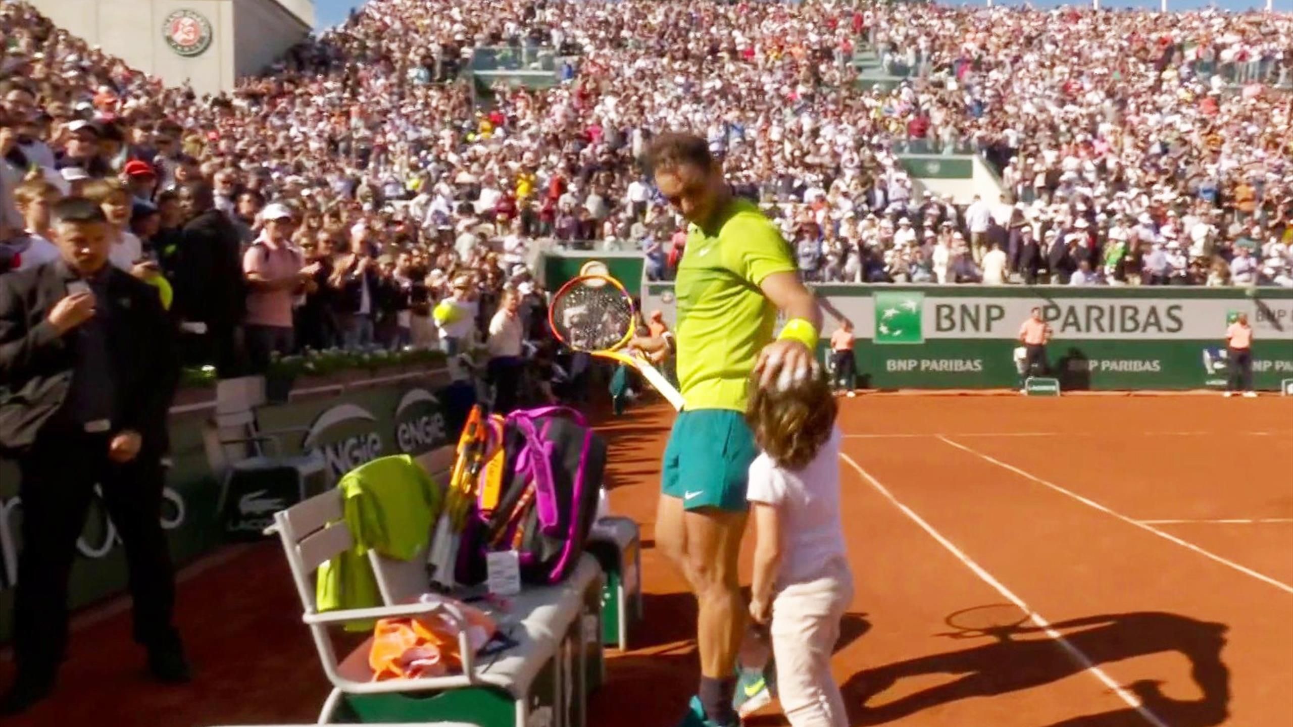 Rafa surprised! - Watch as boy runs on court to greet Rafael Nadal after match at French Open - Tennis video
