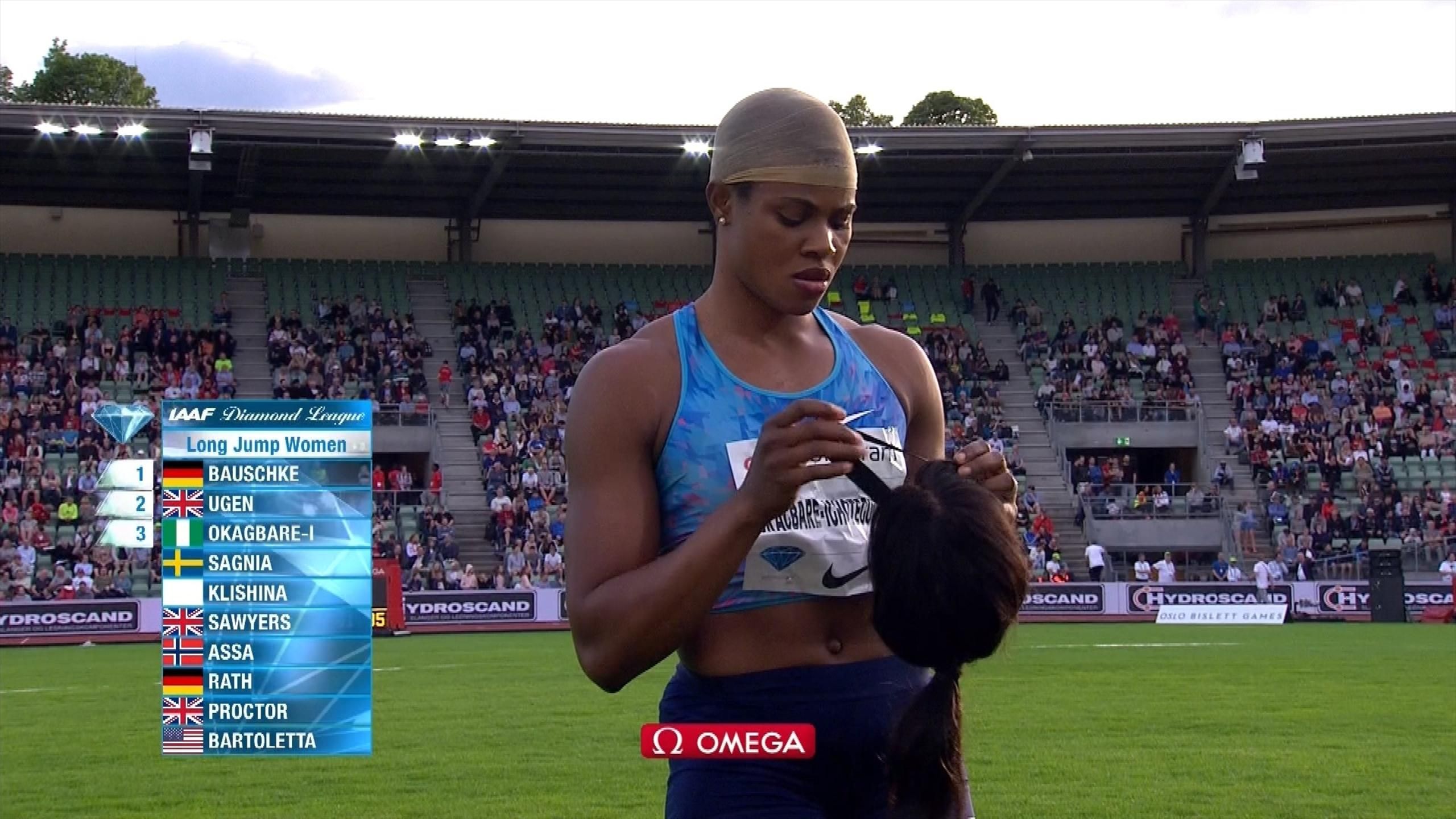 Long jumper Blessing Okagbare s wig falls off on landing Athletics video Eurosport