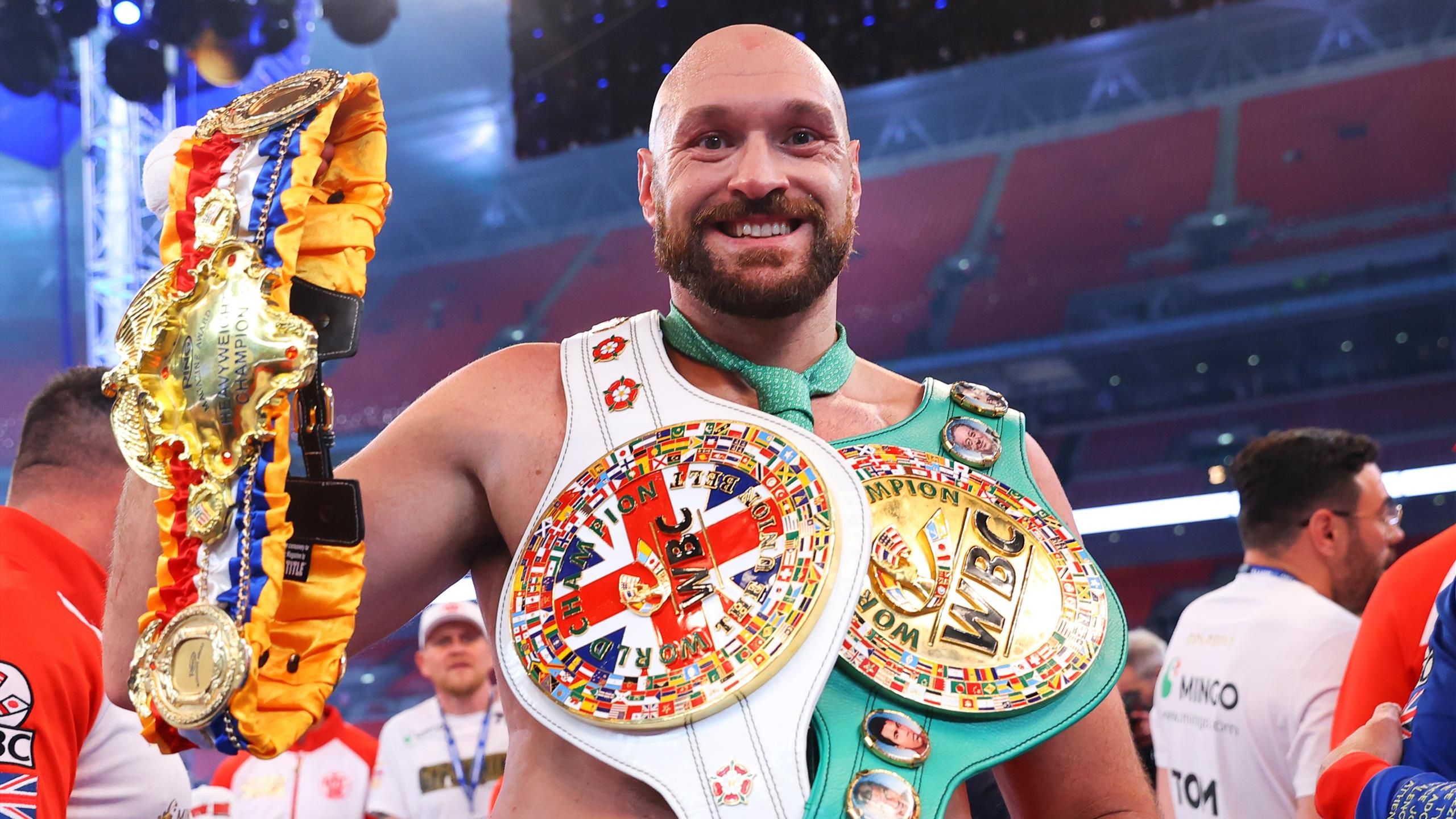 Tyson Fury knocks out Dillian Whyte in sixth round to defend WBC heavyweight title at Wembley Stadium