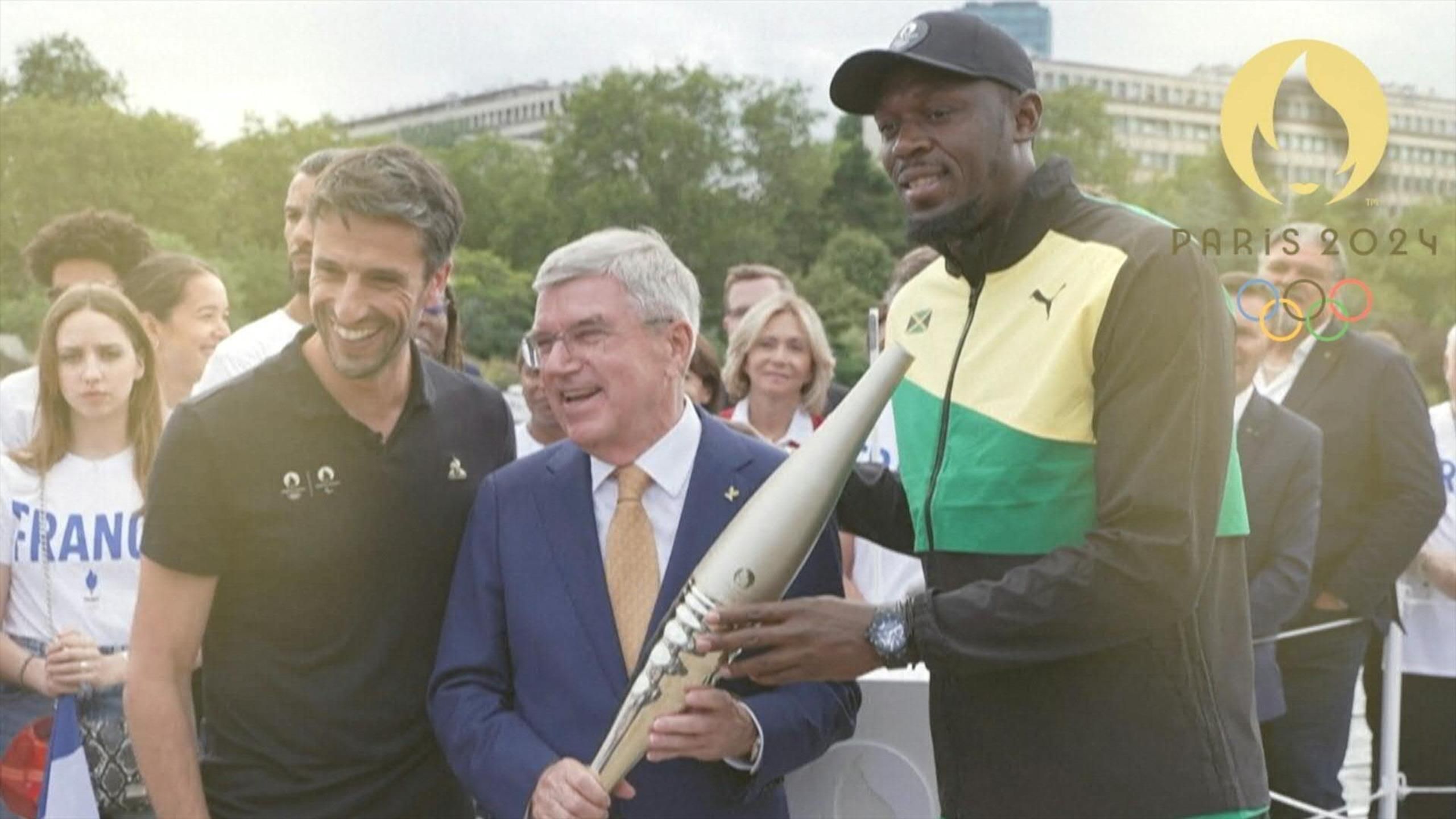 Olympia 2024 IOCPräsident Thomas Bach und Sprintstar Usain Bolt in