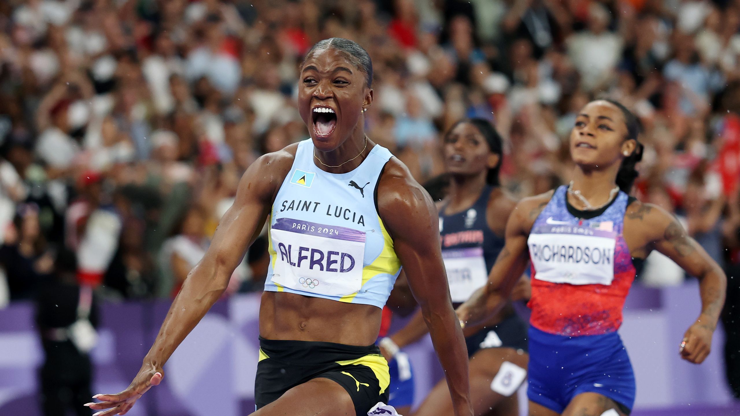 What is the women’s 100m world record? Who won the sprint race at the