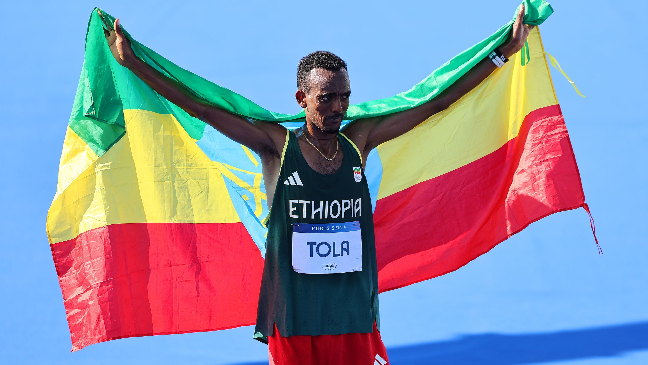 Tamirat Tola Ethiopian claims marathon gold on torturous course as