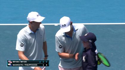 Watch as a ball kid comes up clutch to help Bryan brothers claim doubles victory