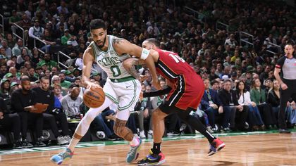 Tatum triple-double seals Celtics win over Heat in series opener