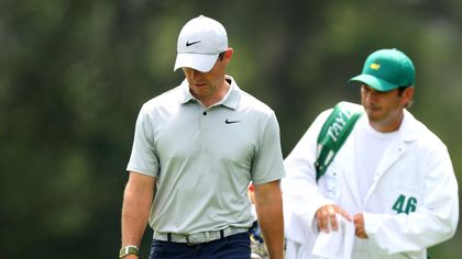McIlroy's Masters bid in tatters, Koepka powers clear at Augusta as weather has its say