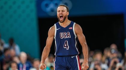 Watch as Curry sinks unbelievable three-pointer and goes wild as USA seal gold