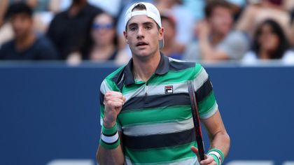 Isner defeats Tomic to advance to New York Open quarters