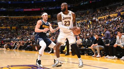 James helps Lakers stay alive with Nuggets win, Celtics regain advantage over Heat