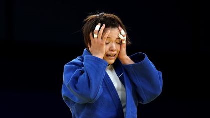 Emotional scenes as defending judo champ Abe left 'sobbing uncontrollably' after shock exit