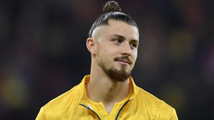 Tottenham sign Romania defender Dragusin from Genoa