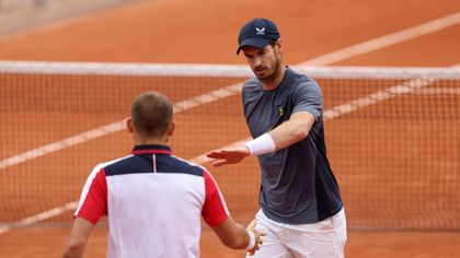 Murray and Evans dumped out of doubles first round in rain