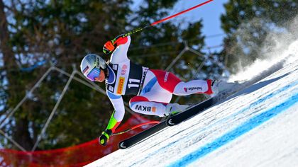 Suter wins last World Cup downhill race before Beijing Olympics