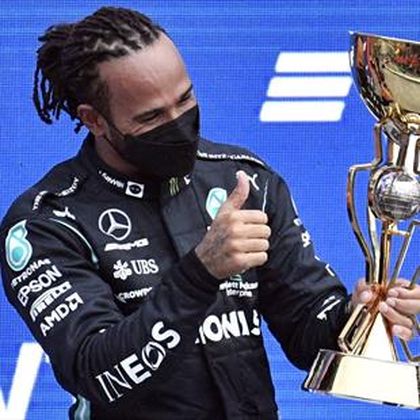 Hamilton overtakes Norris in Russia rain to take 100th win, Verstappen steals second