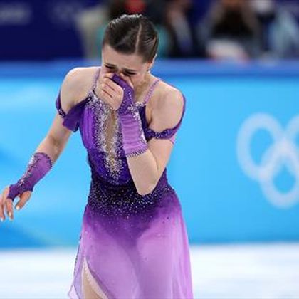 Tearful Valieva summons up remarkable skate to lead short program