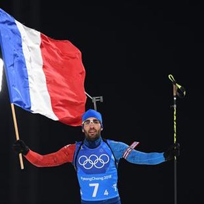 Fourcade skis into record books with fifth Olympic gold