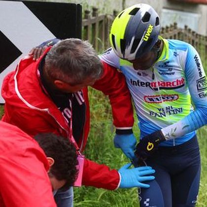 Girmay out of Giro d'Italia after crashing twice on wet roads