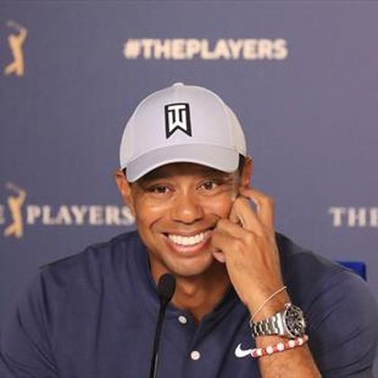 Woods' neck in good shape and he expects putter to be the same