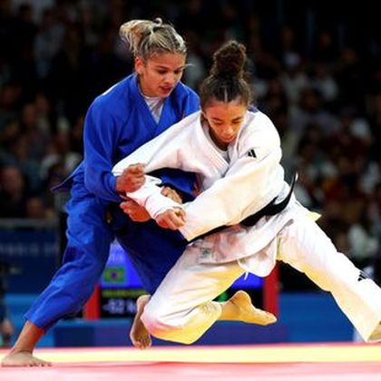 GB's Giles shocked in judo opening contest, Abe retains men's -66kg title