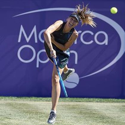 Sharapova wins on return from six-month injury break