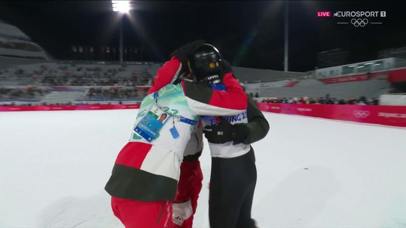 Watch wild and emotional celebrations as Austria win team ski jumping gold