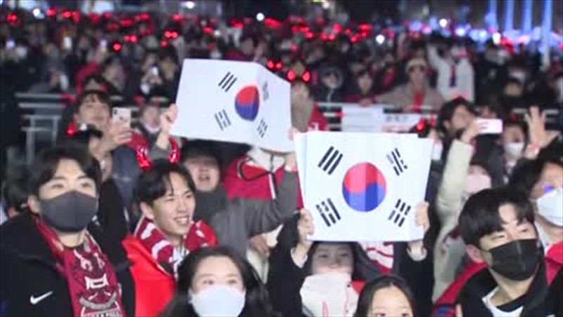 Korean fans in Seoul celebrate shock victory to reach World Cup last 16