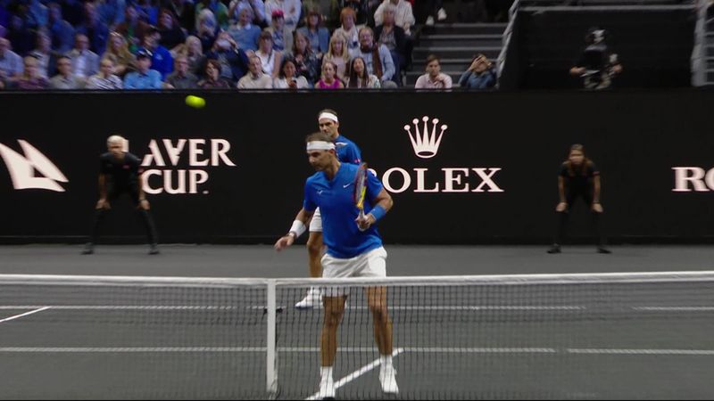 Nadal heads away a tennis ball at the net in his Laver Cup match with Federer