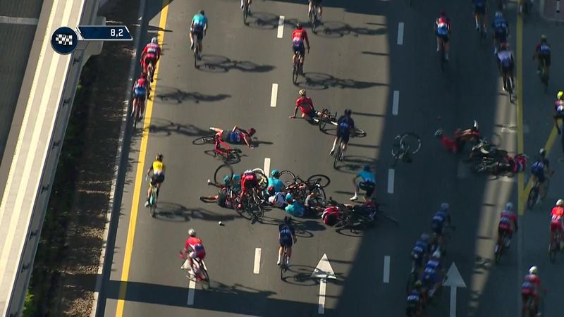 Riders sprawled across road after huge crash on Stage 1