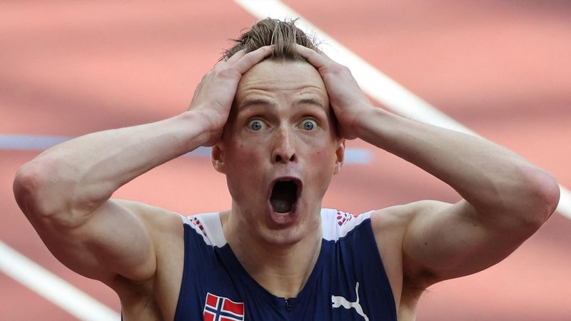 ‘Simply stunning!’ - Warholm smashes own world record to win hurdles gold