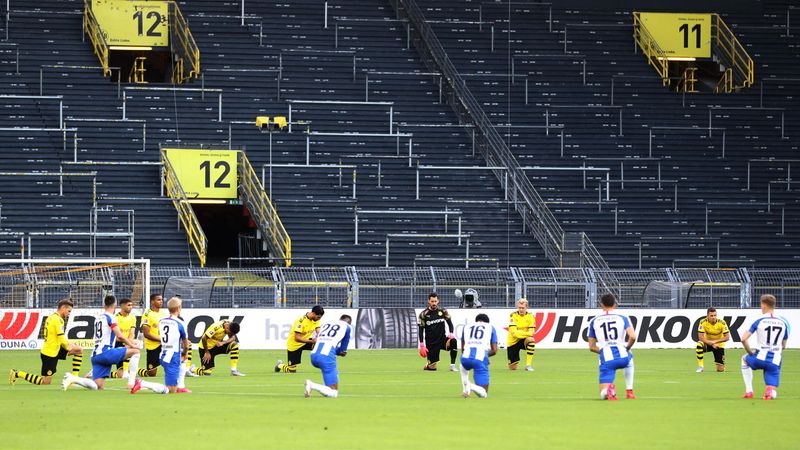 Watch Dortmund and Hertha players and staff take a knee