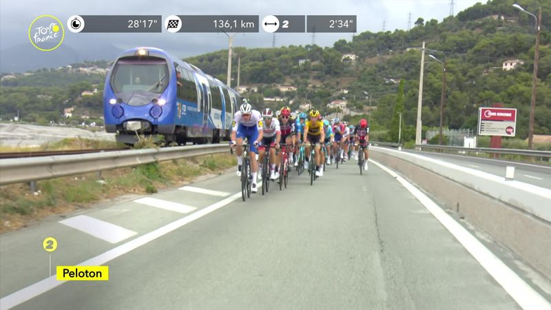 Peloton races train during Stage 1